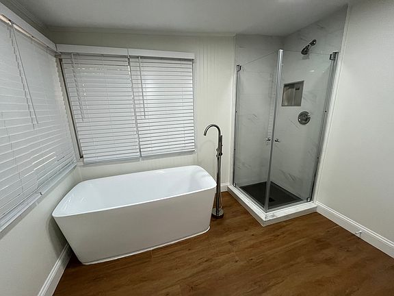 Master Bathroom features standalone tub, shower, double vanity, walk on closet and washer and dryer!