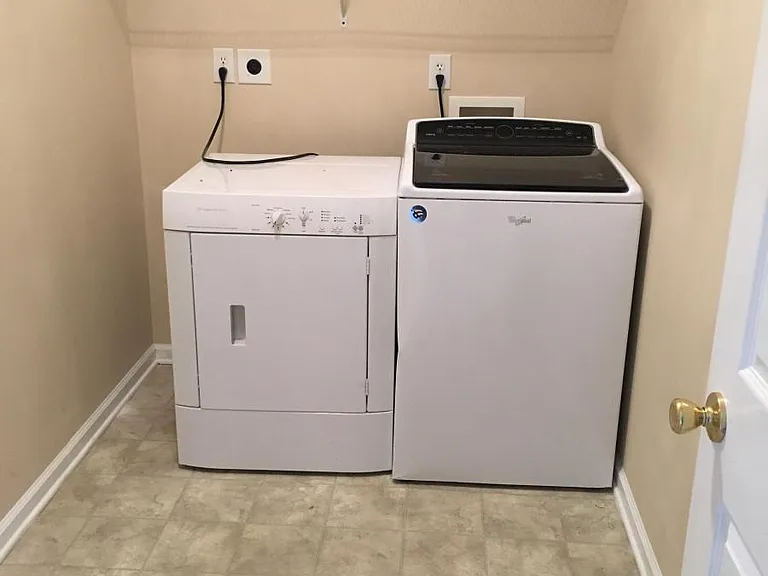 Laundry room washer and dryer includes