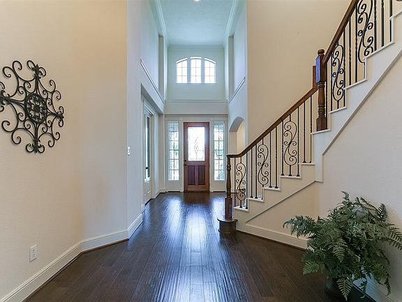 Another view of the fabulous entry. The beautiful hardwoods run seamlessly through this area, the study, formal dining room, and