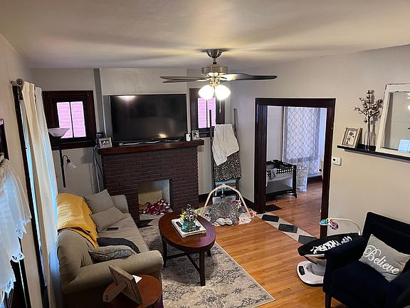 Welcome home! Enjoy this Cozy Living Room with mantle.