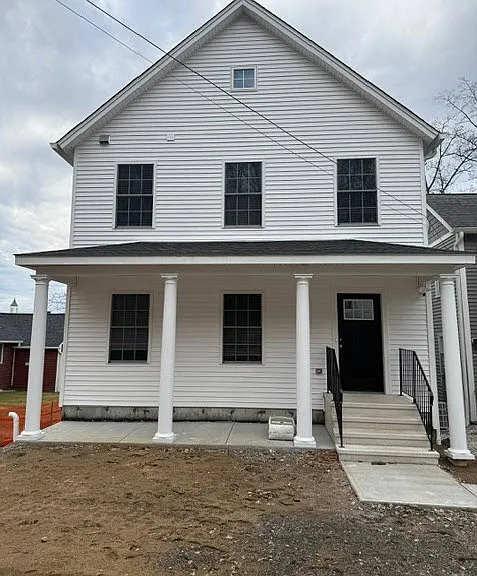 Front of Building. Entrance to front Unit Apt 3. Landscaping to be added in Spring.