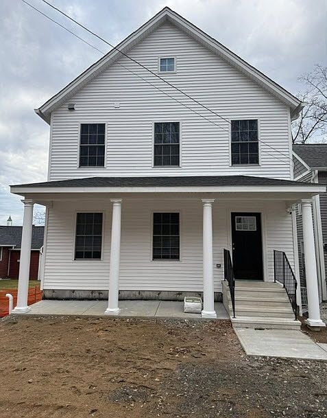 Front of Building. Entrance to front Unit Apt 3. Landscaping to be added in Spring.