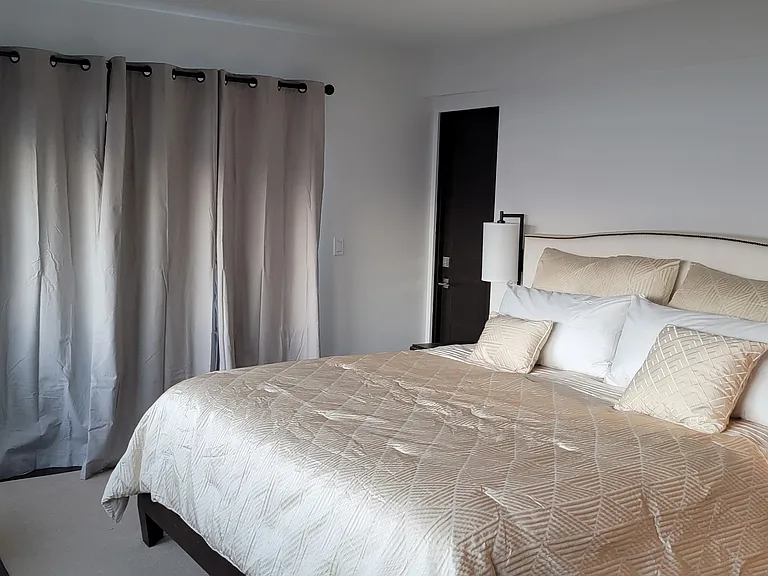 King Master with walk in closet and ocean views