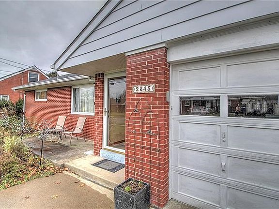 All Brick Ranch With Attached Garage