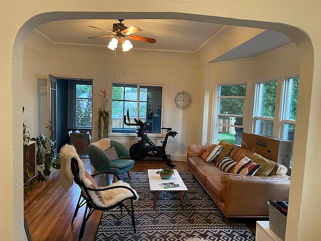 Living room looking east (front) and south (bay window). Lovely morning light comes through!