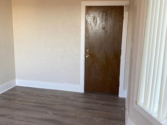 View of front entrance from living room area.