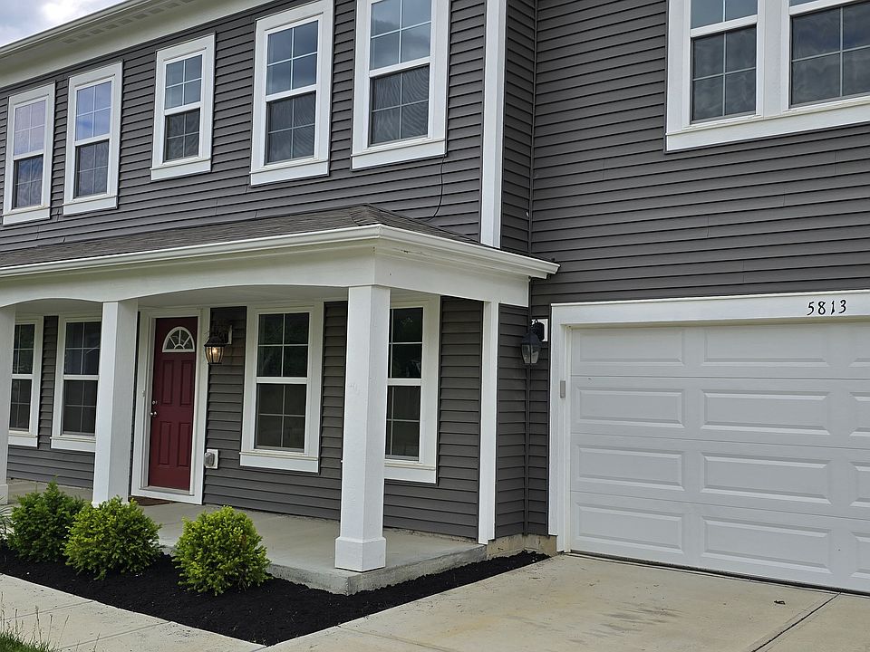 Covered Porch Entrance and Garage