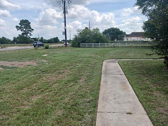 Lots of space in front yard and road frontage on Mueschke corridor at busy intersection of fm 2920