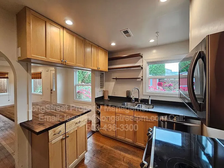 7209 N Amherst St — Photo 15