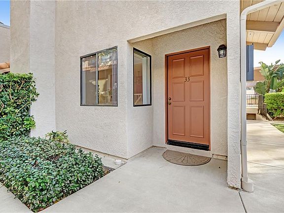 End unit, one common wall, next to pool