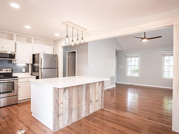 Kitchen, dining room and hallway bathroom.
