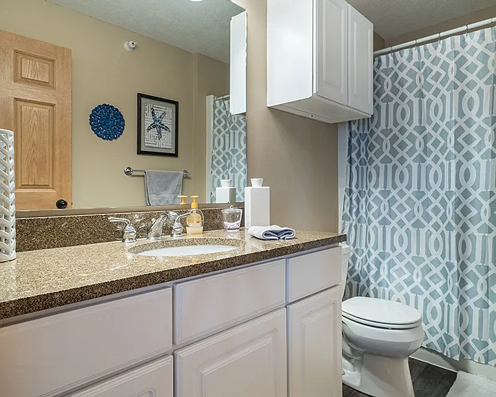 Our bathrooms include spacious vanities with ample storage, perfect for keeping your essentials organized.