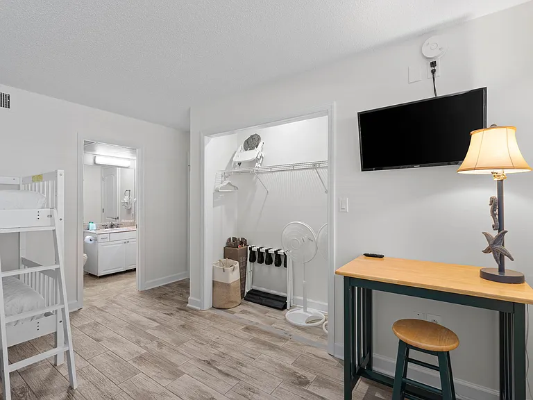 The closet has a pack n play, high chair, luggage carriers, fans and laundry hamper. We do not provide linens for the pack n play. Please bring your own. 

A desk is provided for working space