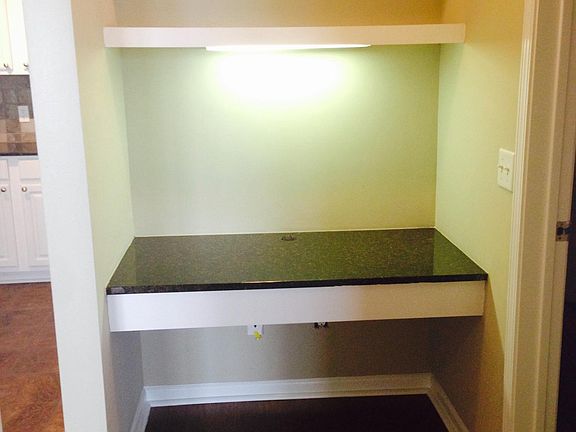 Built in executive desk area, with added built in book shelf's