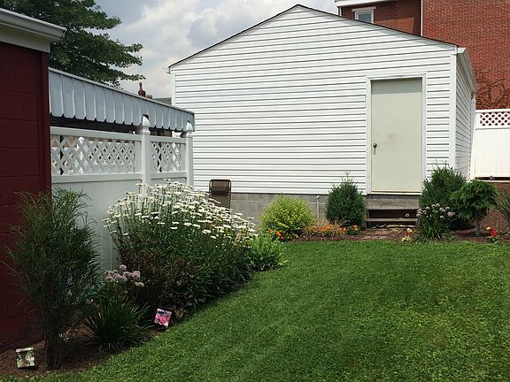 Fenced in yard and garage
