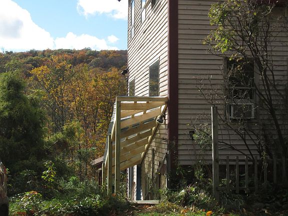 Entrance with new roof over stairs.