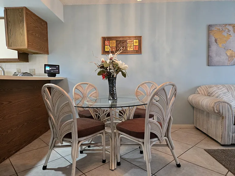 DINETTE SET FOR 4 IS CONVENEIENTLY ADJACENT TO THE KITCHEN