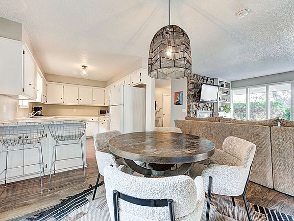 Dining area, breakfast bar and kitchen.