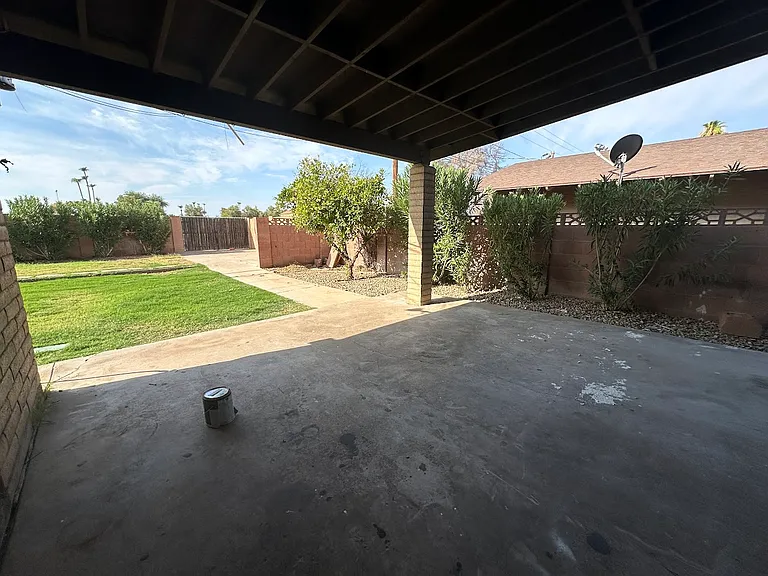 Large covered patio entrance off Kitchen
