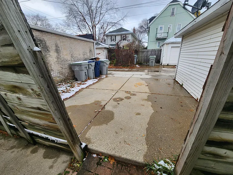 2 Back parking spots, and trash/recycling bins.