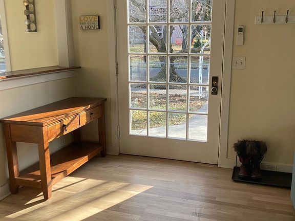 The entry features a giant front door - lovely to leave open in warm weather for an indoor-outdoor connection.
