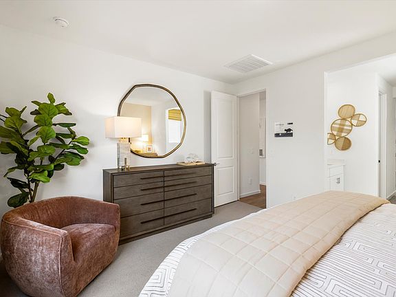 Primary bedroom in the Arlo floorplan modeled at Teravalis