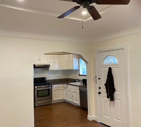 Front door leads directly into living room and kitchen to the right.