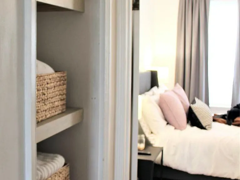 Hallway linen shelves