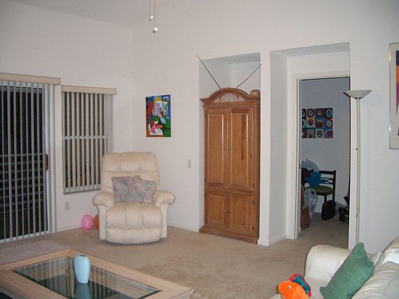 TV Cabinet and "Hers" of "His and Hers" Recliners