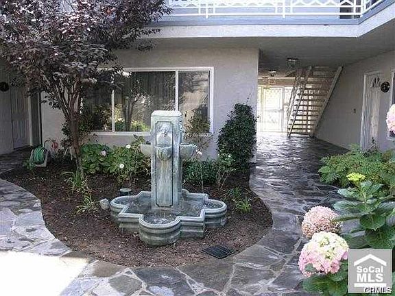 Garden courtyard with a soothing fountain.
