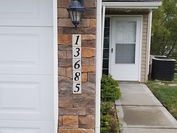 Private entrance, attached garage.