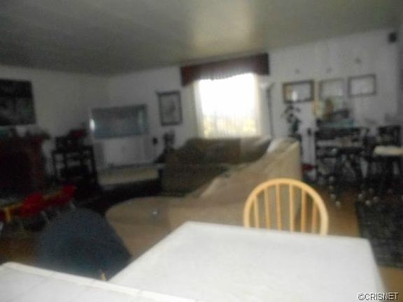 3rd image of 9755 Woodley Ave