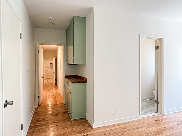 Primary bedroom with original built-in storage