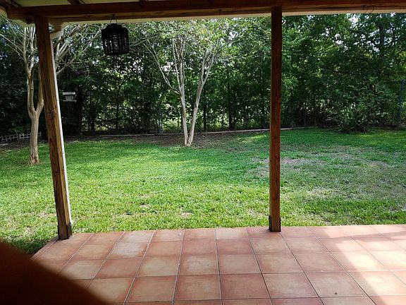 Covered Patio faces Greenbelt