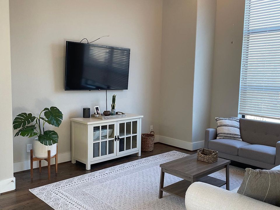 Open concept living space with 14' high ceilings on the second floor