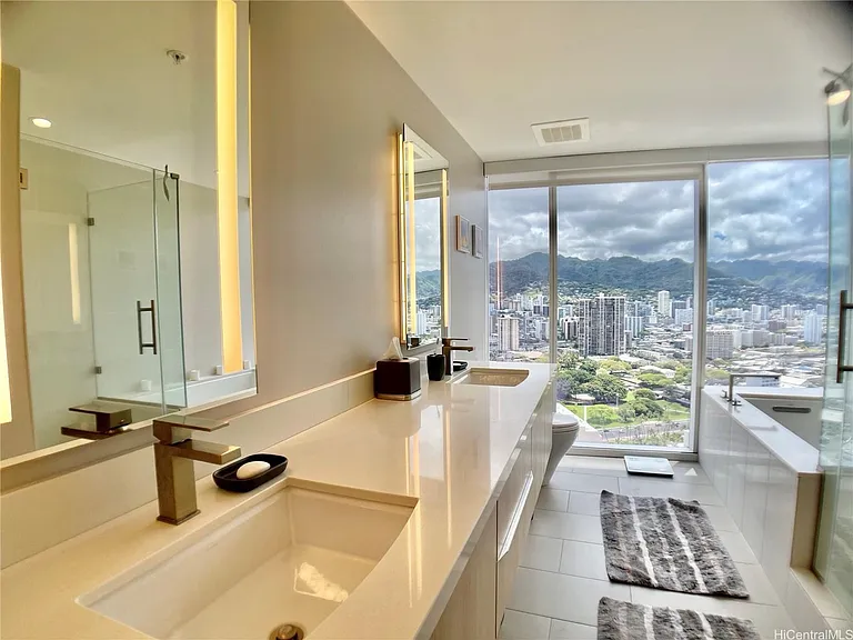 master bethroom dual tub and shower with floor to ceiling open fantastic view