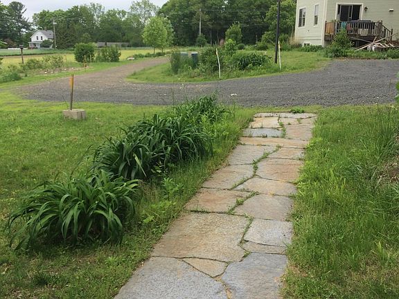 Entrance walk, parking spot, and driveway to Pine St, which is about 500 ft away.
