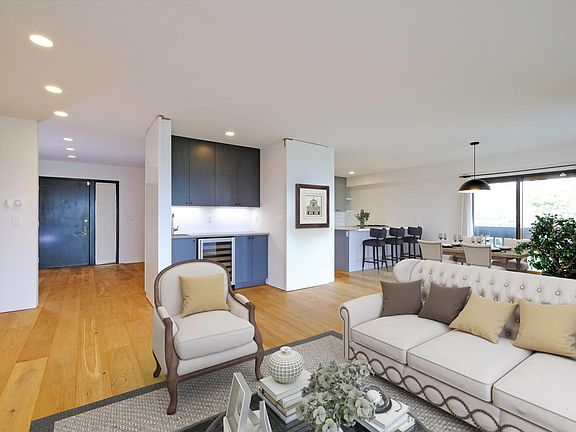 Living room + dining room, staged