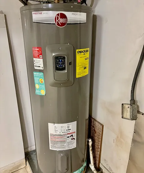 NEWER Hot Water Heater by Rheem - installed in 2023