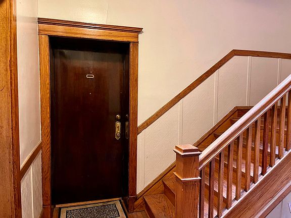 This lovely entry to first floor walk up.