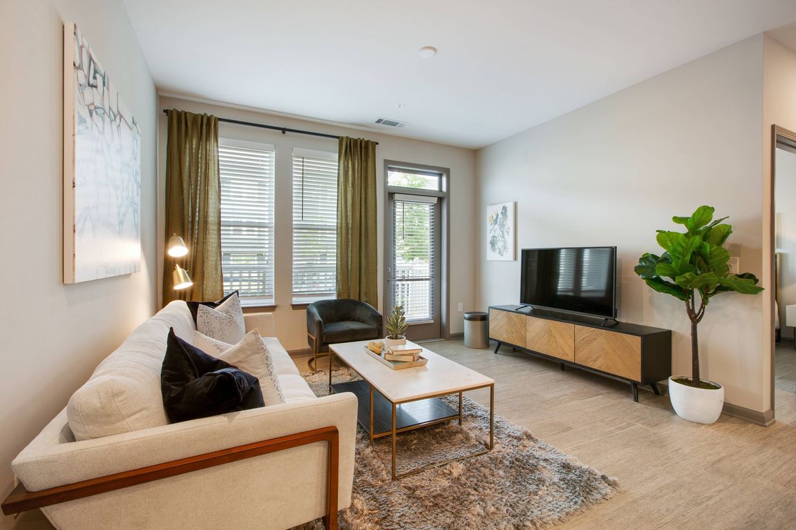 Living Room with Gorgeous Hardwood-Style Flooring