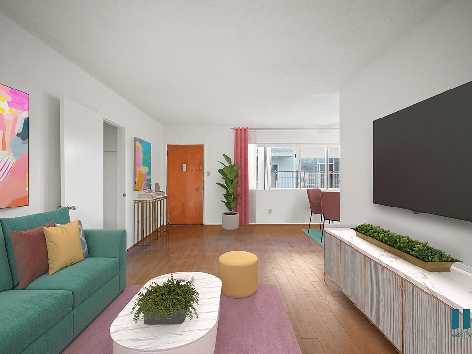 Entryway, Living, and Dining Room with Windows