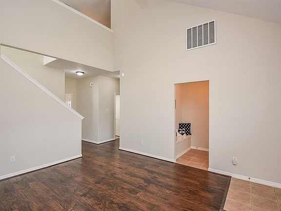 A view from the living room to the mud room, the half bath and hall leading to the Master Bedroom. Notice how open it is!