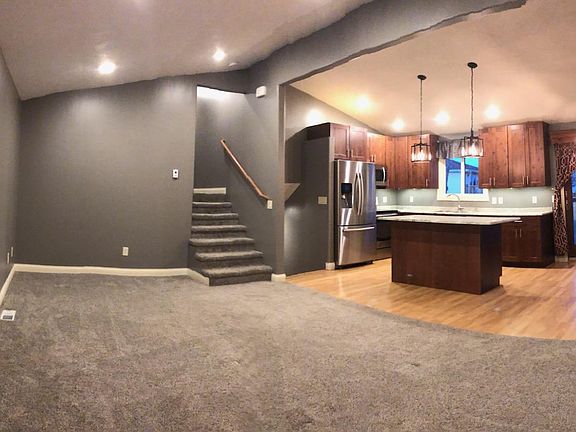 Open living concept with walkout deck.