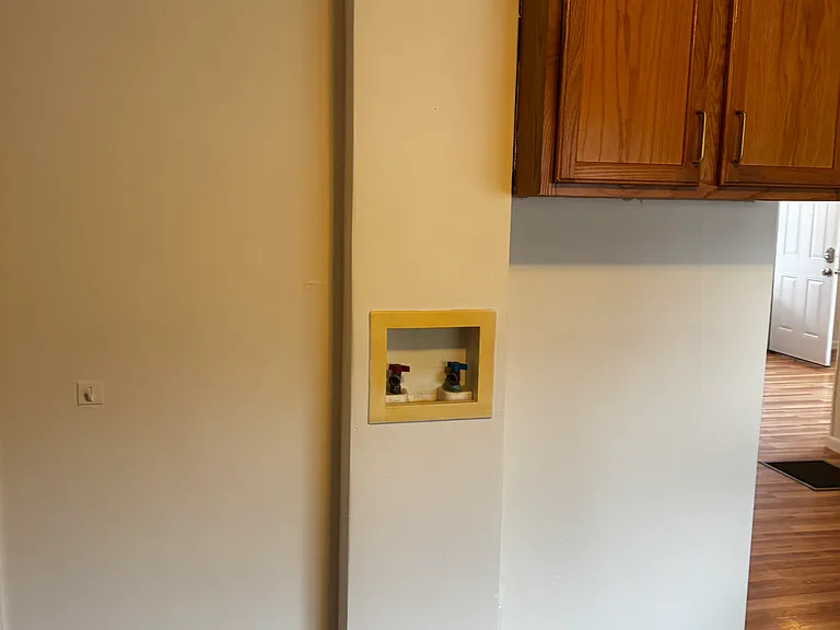 Washing Machine and Dryer hook up in the kitchen.