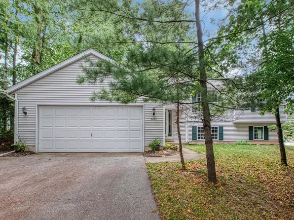 5763 Ada Dr SE, Ada, MI 49301