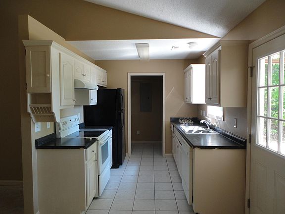 kitchen includes walk-in pantry/laundry