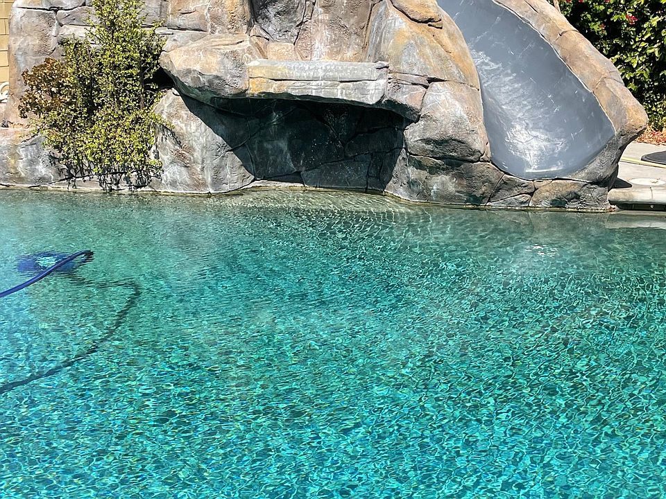Backyard with rockslide