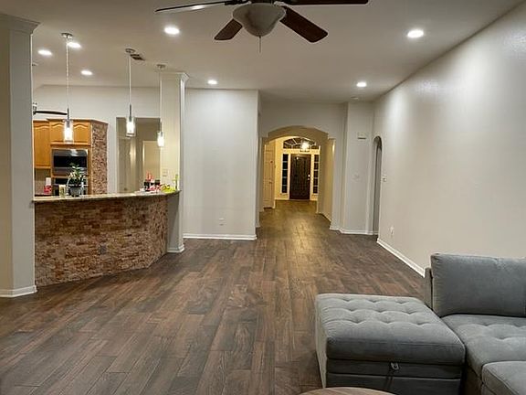 Open concept with new wood flooring
