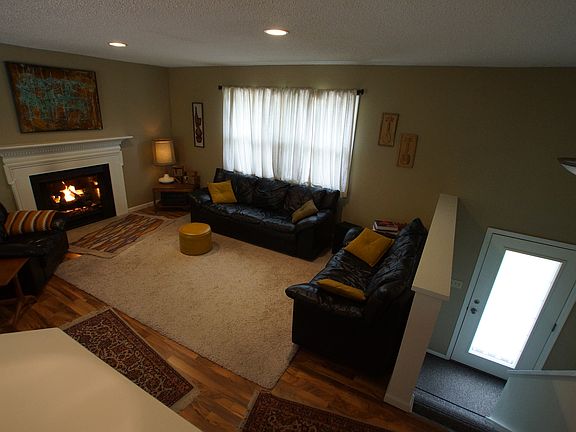 Open flame gas log fireplace.